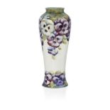 William Moorcroft (1872-1945), a Pansy pattern vase 1911-1913, signed in green W Moorcroft,