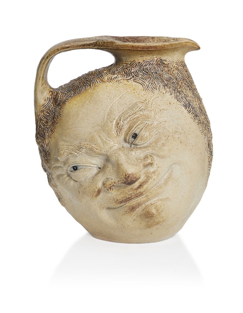 R.W. Martin (1843-1923), a large Martin Brothers stoneware salt-glazed Double ‘Face’ jug c.1890,