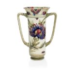 William Moorcroft (1872-1945), a Persian pattern twin-handled ceramic vase c.1920, signed in green W