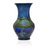 William Moorcroft (1872-1945), a Moonlit Blue pattern ceramic vase c.1925, signed W M, impressed