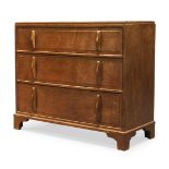 Cotswold School, an oak chest of drawers c.1930 With three long graduated drawers, raised on