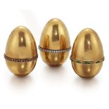 Three 18ct gold diamond and gem egg design ornamental novelty boxes, with screw fittings, each egg