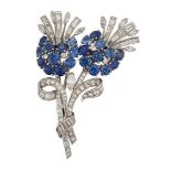 A sapphire and diamond brooch, of brilliant, baguette, marquise and single-cut diamond stylised