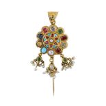 An Indian gem and enamel pendant / stickpin, of Navaratna design, the central foiled pear shaped