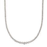 A diamond necklace, composed of a graduated line of brilliant-cut diamond collets, length 40.