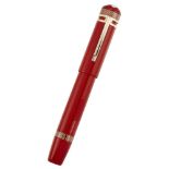 A large, retractable limited edition fountain pen, by Montblanc, the terracotta resin barrel and cap