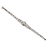 A diamond bracelet, the central cluster with triple row shoulders and twin line bracelet, set