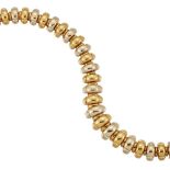 An 18ct two colour gold necklace by Bulgari, designed as a series of alternating white and yellow