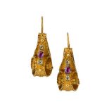 A pair of early Victorian gold and gem-set earrings, each of scroll design set with garnets and pale