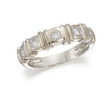 A diamond half-hoop ring, the five brilliant-cut diamonds collet-set between bar spacers to a