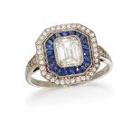 A diamond and sapphire cluster ring, the cut-cornered rectangular diamond centre to a calibre-cut