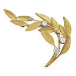 An 18ct gold, diamond leaf brooch, designed as a spray of textured navette shaped leaves randomly-