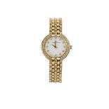 A lady's 18ct gold and diamond wristwatch, by Baume & Mercier, the circular dial with diamond