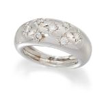 A diamond gypsy-set ring, the seven brilliant-cut diamonds in star mounts within a tapering hoop,