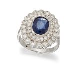 A sapphire and diamond cluster ring, the collet-set oval sapphire to brilliant-cut diamond two row