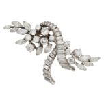 A diamond brooch, of brilliant and marquise-cut diamond stylised floral spray design with