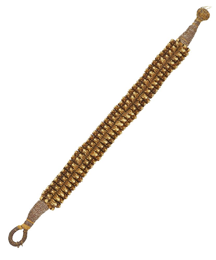 An early 20th century Indian gold bracelet, composed of a series of strung reeded pyramidal design