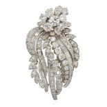 A diamond floral spray brooch, the brilliant and marquise-cut diamond flowerhead cluster to a