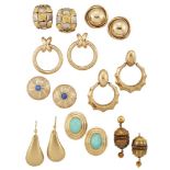 Eight pairs of earrings, including: a pair of ear studs designed as shields with star sapphire