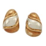 A pair of 18ct two colour gold earclips by Bulgari, of tapered bombe design, signed Bulgari, with