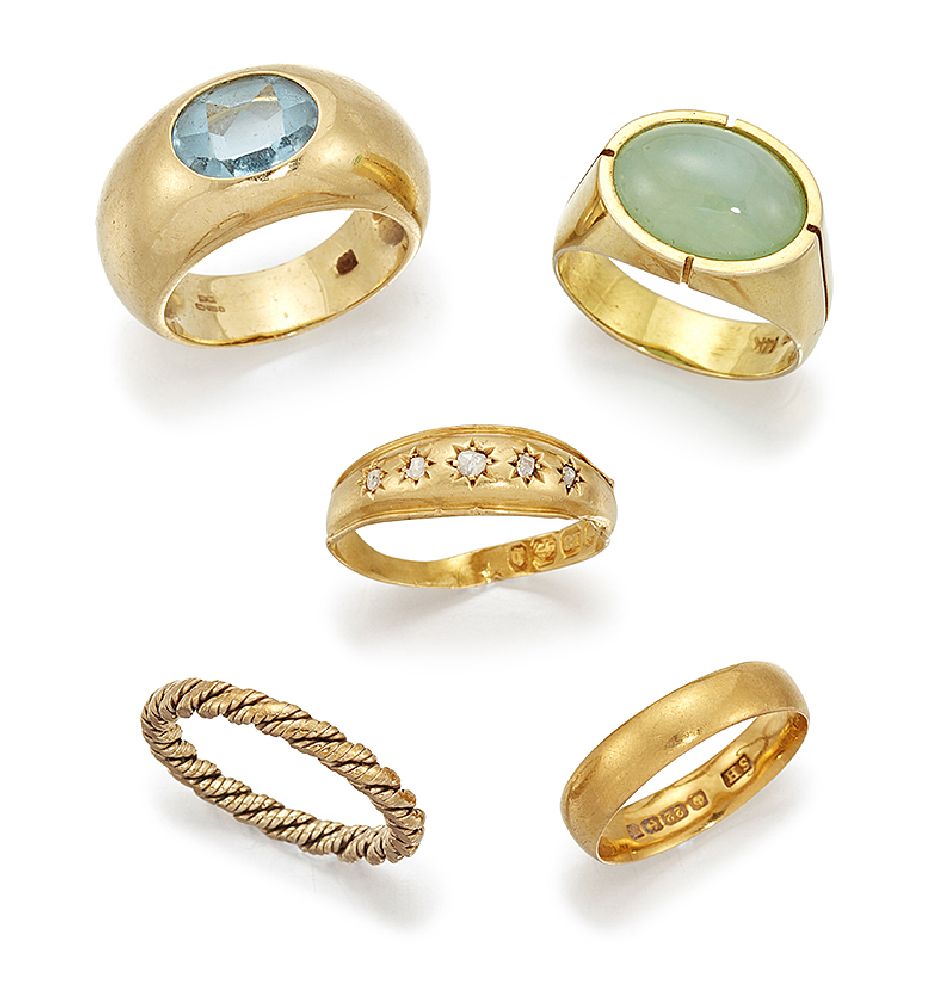 A group of five rings, comprising: an 18ct gold ring inset with five small rose cut diamonds,