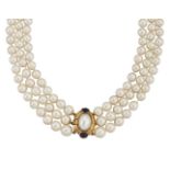 A cultured pearl and gem necklace by Deakin & Francis, the three rows of slightly graduated cultured