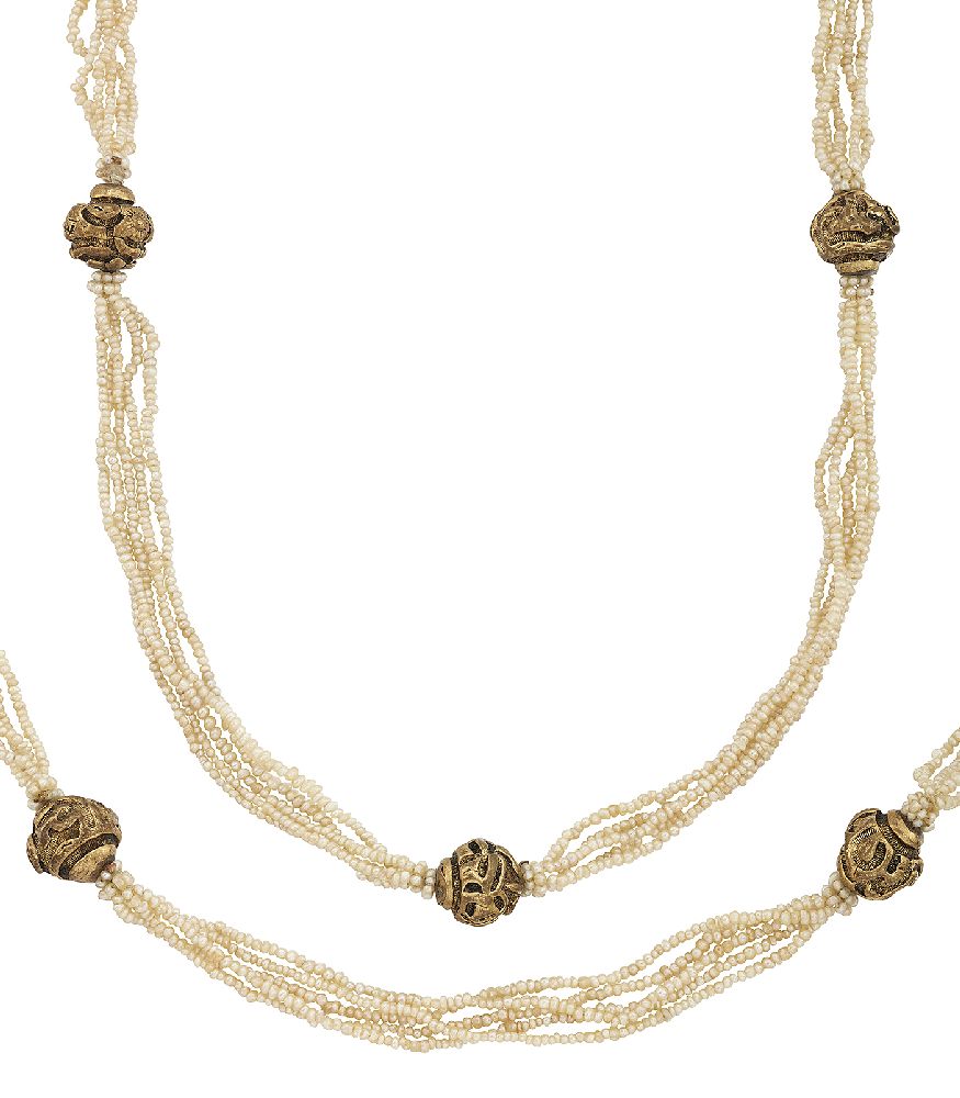 An early 20th century seed pearl sautoir necklace, with gilt chased bead spacers, c. 1925, length