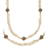 An early 20th century seed pearl sautoir necklace, with gilt chased bead spacers, c. 1925, length