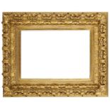 A Bolognese Carved and Gilded Frame, 18th century, with cavetto sight, beaded course, the hollow