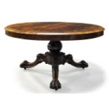 A Victorian rosewood breakfast table, the circular and brass inlaid tilt top, on central baluster