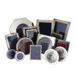 Fourteen various photograph frames, four silver: three of circular and one of rectangular form,