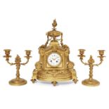 A French gilt bronze mantel clock, late 19th/early 20th century, the case mounted with a large urn