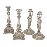 Two pairs of white metal candlesticks, the first, designed as ladies carrying urns raised on a