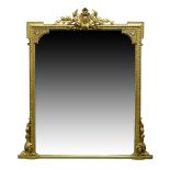 A Victorian gilt and gesso overmantle mirror, with central cabochon cresting, flanked by laurel