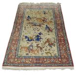 A Kashan hunting rug, mid/late 20th Century, with huntsman on horseback chasing wild beasts, 233cm x