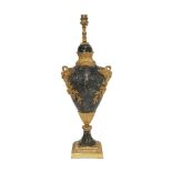 A gilt metal mounted serpentine table lamp, in the Louis XVI style, 20th century, with two swan form