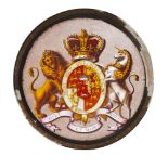 A painted circular glass panel bearing a coat of arms of the Order of the Garter, 20th century,
