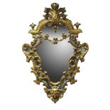 A pair of Venetian style carved giltwood mirrors, early 20th Century, the cresting centred by carved