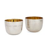 A pair of silver tumblers with gilt wash interiors, London c.1972, one Garrard & Co., the other CJ