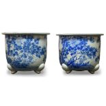 A pair of Chinese blue and white porcelain fish bowls or planters, 20th century, with stylised lotus