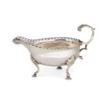 A George III small silver sauce boat, London, c.1775, William Cattell, designed with a punch-bead