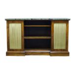 A Regency rosewood inverted breakfront side cabinet, the later green marble top above central open