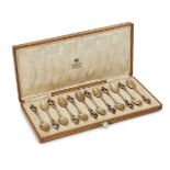 A set of twelve silver spoons, by Faberge, Moscow, c.1880, in fitted, signed box, the spoons with
