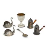 Two miniature German silver swans, both with flat bases and realistically chased with feathers,