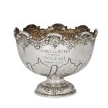 A silver presentation bowl, Sheffield, c.1905, Levesley Brothers, the half-lobed twist repousse bowl