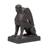 A Wedgwood black basalt model of a sphinx, late 20th century, seated on a rectangular plinth,