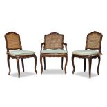 A Louis XV beech and caned fauteuil, mid 18th Century, the cartouche shaped backrest, having