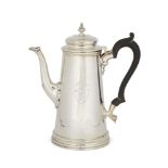 A silver coffee pot, London, c.1943, CJ Vander, of plain tapering form with carved wooden scroll