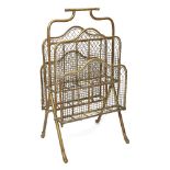 An Edwardian four division brass and mesh magazine rack, on curving feet, 71cm highPlease refer to