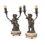 A pair of French bronze and marble two light candelabra, late 19th century, moulded with figures